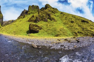 Scenic summer Iceland. The canyon Pakgil fast flowing shallow stream. The photo was taken Fisheye