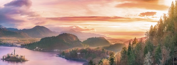 Panoramic view with the Bled island, the lake and the surrounding hills, in amazing colors due to