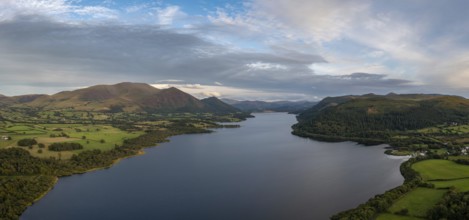 An aerial view of Bassenthwaite Lake in the English Lake District in warm eveing light