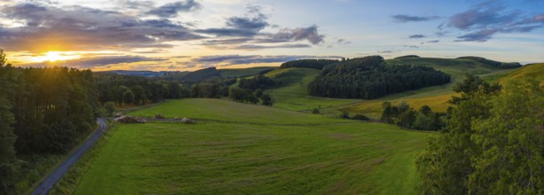 Panorama Of A Beautiful Sunset Over Gentle Rolling Hills In The Scottish Borders