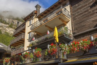 House decorated with flowers in Zermatt, alpine village, Switzerland, Swiss Alps, Europe