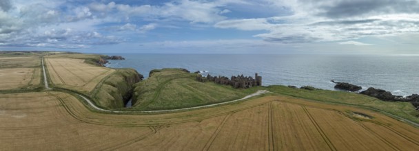 Slains Castle, castle ruins on the cliffs, drone shot, Cruden Bay, Peterhead, Aberdeenshire,