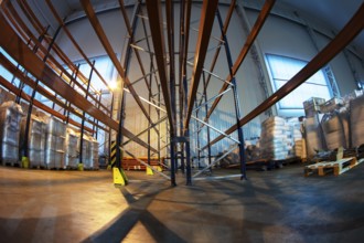 Storage rooms in a factory or workshop with metal shelving