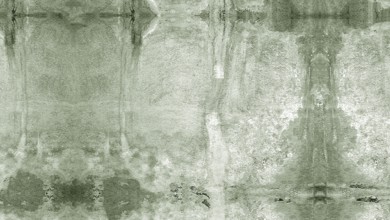 Green abstract painted background with a watercolor texture, perfect for adding a touch of elegance