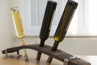 Original schnapps bottle stand made from a barrel stave, Austria, Europe