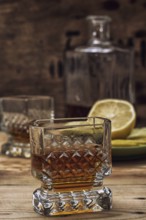 Seasoned brandy into the glasses and decanter vintage style