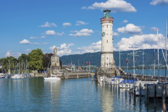 GERMANY, LINDAU - AUGUST 21: view of the lighthouse and a lion statue at the entrance to the port