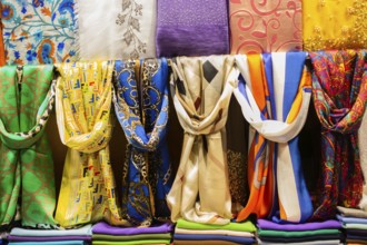 Pile of bright Multi-colored pieces of fabric in a bazaar