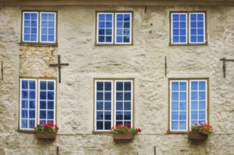 The facade of the old building with six windows in Riga, Latvia, Europe