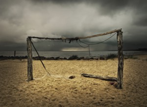 Football goals at the beach in stormy weather