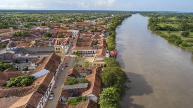 Aerial view of the historic town Santa Cruz de Mompox and river in sunlight, Colombia, World