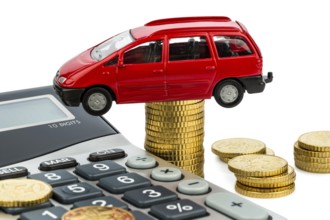 Car and calculator. Rising costs for car purchase, leasing, workshop, refuelling and insurance