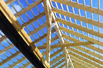 Roof construction made of wood, symbolic photo for home ownership, house construction and house