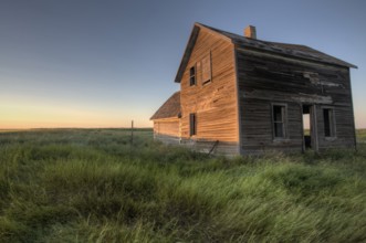 Abandoned Farmhouse Saskatchewan Canada sunset and prairie view