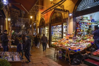 People walking on the street in the old town of Bologna, Italy, Europe
