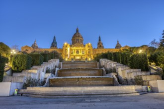 The National Palace on the Montjuic hill in Barcelona illuminated at dusk