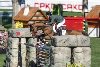 Cian O'Connor of Ireland, riding Fancy de Kergane compete in the BMO Nations Cup during the CSIO