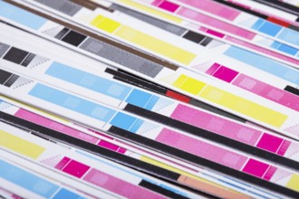 CMYK color on printed sheets of paper after cutting