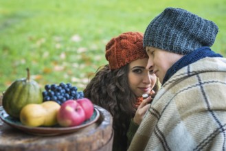 Portrait of couples in the autumn garden