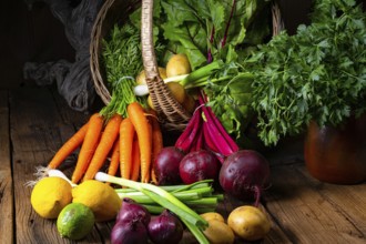 Basket with various vegetables: beetroot and carrots