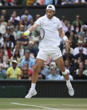 Italian tennis player Lorenzo Musetti in action at the 2024 Wimbledon Championships, London,