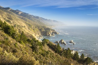 Coastal view of Big Sur landscape and scenery, with pacific ocean and rocks on the coastline during