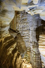 Interior of a deep cave with its columns and rock formations in Lagoa Santa in the state of Minas