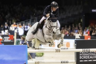 Matthew Sampson of Great Britain competes in the equestrian Audi Grand Prix at Jumping