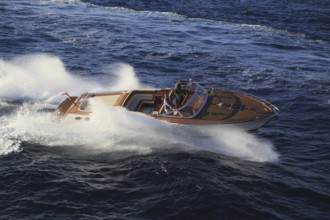 Aerial view sports boat J Craft 42 Torpedo R at full speed on the Cote d'Azur, luxury motorboat