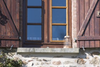 French windows with shutters and light equipment
