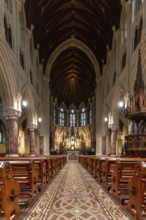 Cobh, Ireland, 15 August, 2022: vertical view of the central nave and altar inside the Cobh