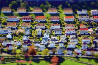 Tilt-shift creative image of an upper-class residential city suburb district with houses and