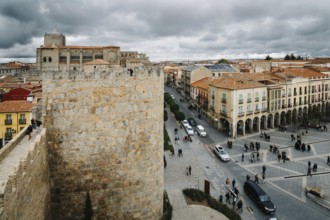 Avila, Spain, November 11, 2014: Cityscape of Avila from Medieval Walls a cloudy day. The old city