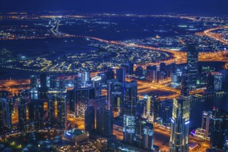 Dubai night view seen from the observation deck of Burj Khalifa. Shooting Location: Dubai