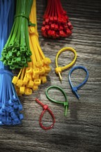 Collection of plastic cables on vintage wooden board