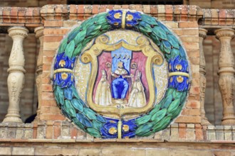 Plaza de España in Seville, Seville, Andalusia, Spain, Europe, A colourful relief of a coat of arms