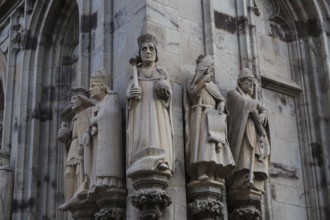 Statues of the saints and kings on cathedral in Cologne, Germany, Europe