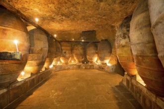 Antique winery in Spain with clay vessels terracotta amphora pots Mediterranean tradition with