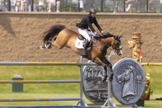 Vaclav Stanek from Czechoslovakia, and riding Quintin, compete in the 1.60m Grand Prix during The