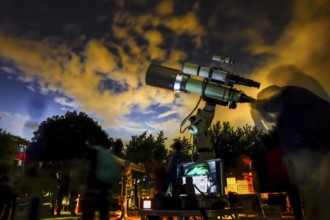 Image of astronomical observations at the telescope. Shooting Location: Tokyo metropolitan area