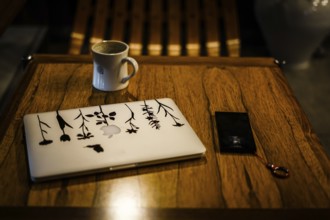 Laptop and smartphone. Shooting Location: Tokyo metropolitan area