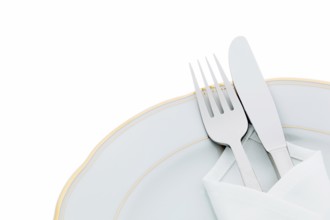 A knife with fork and plate. Place setting for a dinner in a restaurant. Austria