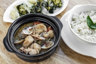 Traditional fish clams and mixed seafood portuguese spicy soup stew meal
