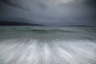 Heavy swell under a cloudy sky, harbour, Mittelzell, Reichenau, Lake Constance, Baden-Württemberg,