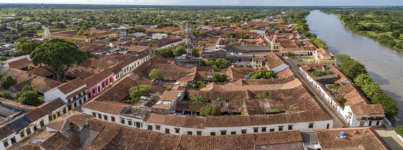 Panoramic aerial view of the historic town Santa Cruz de Mompox and river in sunlight, Colombia,