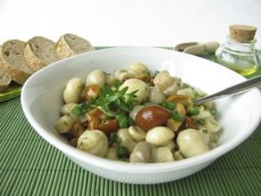 Mushroom salad with button mushrooms and mallard mushrooms