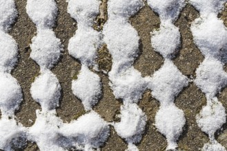 Wavy pattern after a snowfall as background