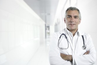 Gray hair expertise handsome senior doctor hospital portrait white corridor