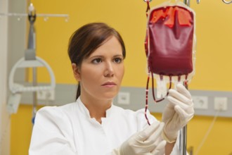 A nurse in a clinic with a blood bank. Infusion of donated blood. Austria