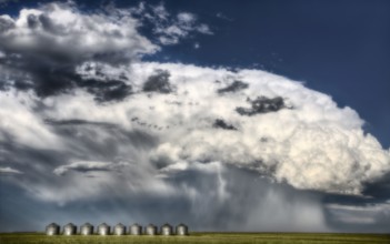 Prairie Road Storm Clouds Saskatchewan Canada field metal granaries